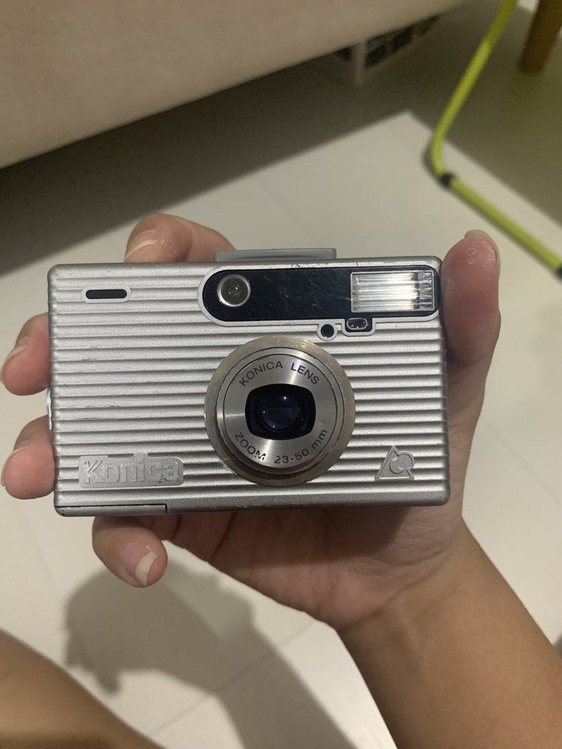 Konica Revio II Camera APS Silver 23-50mm Zoom (Category: Cameras) located in Quezon City. Submitted by chie_19 (Listing ID 1437482953, Image 2). Description: - Konica Revio II Camera APS Silver 23-50mm Zoom - Zoom lens: 23-50mm - Power button and mode selection - LCD screen - Battery compartment visible - In good working condition Example pictures: https://www.lomography.com/cameras/3337136-konica-revio/photos.