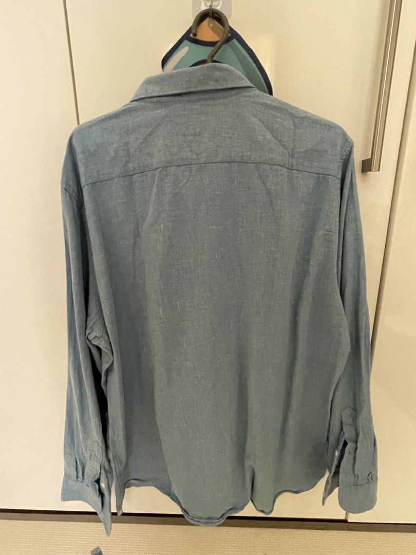 Lacoste Regular Fit Long Sleeve Shirt (Category: Tshirts & Polo Shirts ) located in Manila. Submitted by baymaxthegreat (Listing ID 1437418146, Image 3). Description: - Lacoste long sleeve shirt - Light blue color - Regular fit - Size: FR 43 / US L/XL - Iconic Lacoste logo on chest - Button-down closure - Classic collar - Lightweight fabric - Perfect for casual wear.