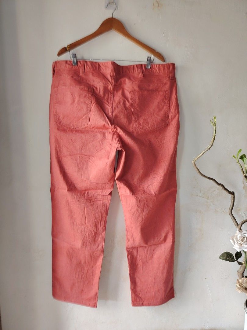 Lands' End Traditional Fit Pants (Category: Jeans) located in Magdalena. Submitted by magdalenathrift20 (Listing ID 1437417094, Image 3). Description: - Lands' End pants - Vibrant coral color - Size: 42/T - Traditional fit - Multiple pockets - Durable fabric - Classic and versatile design.