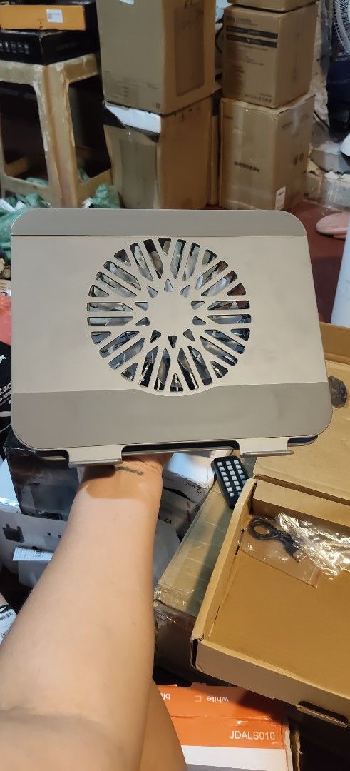 Laptop Cooling Pad with Fan (Category: Laptops & Notebooks) located in Malabon City. Submitted by granmerlencagayandeoro (Listing ID 1437581130, Image 2). Description: - Built-in fan for efficient laptop cooling. - Adjustable stand for optimal viewing angles. - Sleek, modern design. - Durable construction. - Convenient USB port for power..
