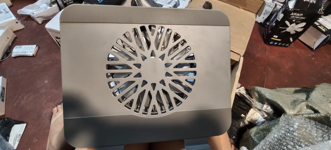 Laptop Cooling Pad with Fan (Category: Laptops & Notebooks) located in Malabon City. Submitted by granmerlencagayandeoro (Listing ID 1437581130, Image 3). Description: - Built-in fan for efficient laptop cooling. - Adjustable stand for optimal viewing angles. - Sleek, modern design. - Durable construction. - Convenient USB port for power..