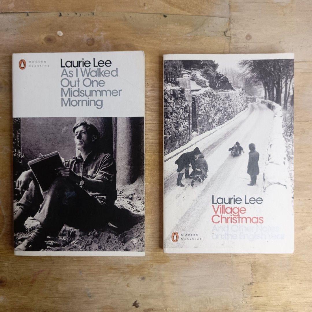 Laurie Lee Penguin Modern Classics Books (Category: Storybooks) located in Manila. Submitted by shelfenjoyment (Listing ID 1437517486, Image 1). Description: 349 each. Take both for 500. Two Penguin Modern Classics books by Laurie Lee. Titles include "As I Walked Out One Midsummer Morning" and "Village Christmas and Other Notes on the English Year". Both books have visible wear on the edges. The books are in English..