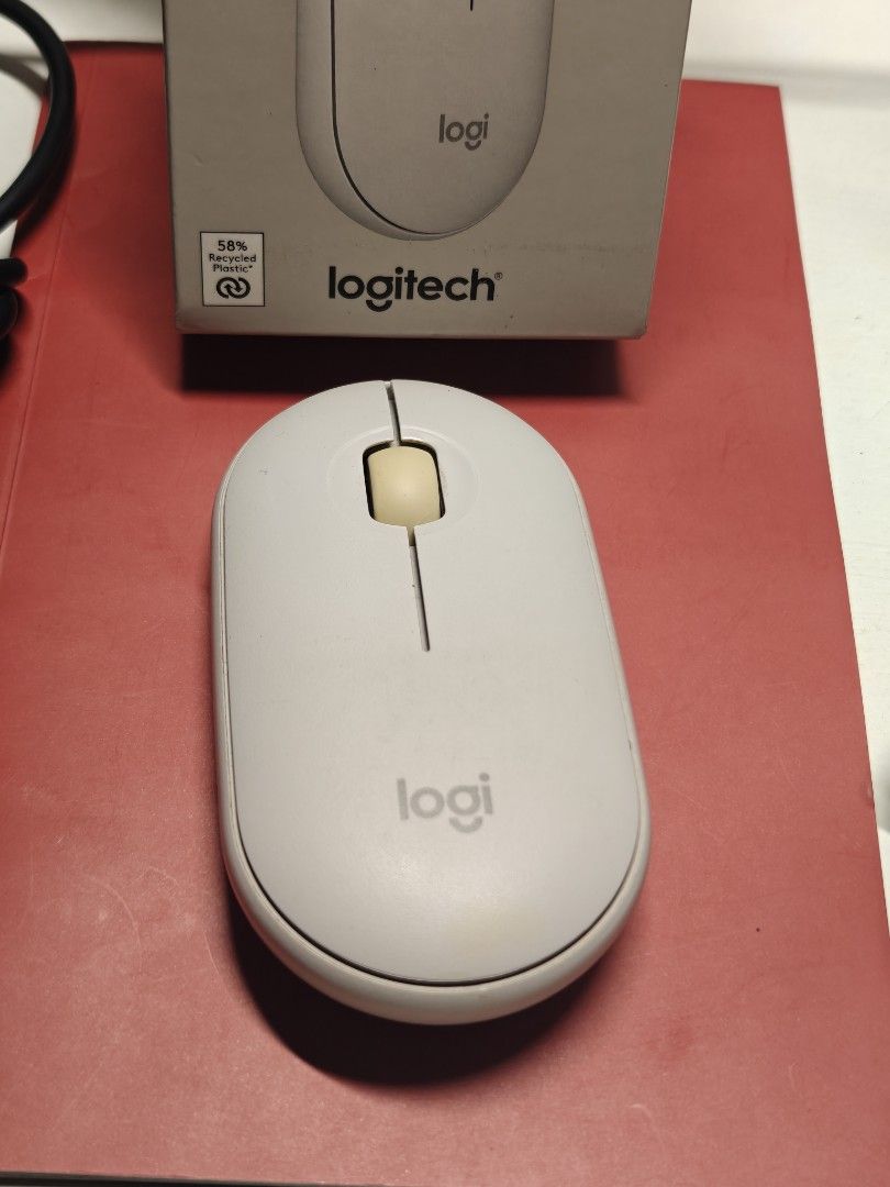 Logitech Pebble Mouse 2 M350s (Category: Mouse & Mousepads) located in Balanga. Submitted by einein (Listing ID 1437496556, Image 1). Description: - Logitech Pebble Mouse 2 M350s - Wireless Bluetooth mouse - Silent click technology - Minimalist white design - Part of the Logitech Studio Series.