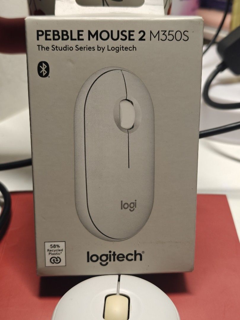 Logitech Pebble Mouse 2 M350s (Category: Mouse & Mousepads) located in Balanga. Submitted by einein (Listing ID 1437496556, Image 2). Description: - Logitech Pebble Mouse 2 M350s - Wireless Bluetooth mouse - Silent click technology - Minimalist white design - Part of the Logitech Studio Series.