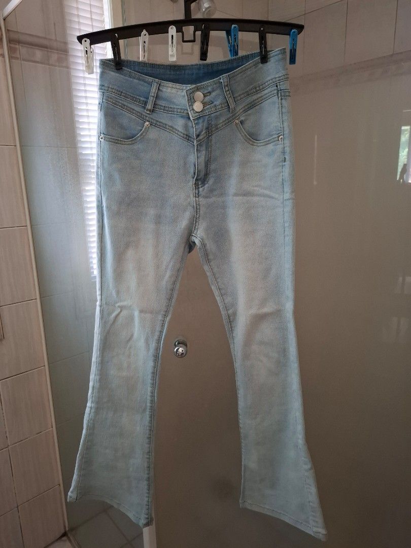 Flared light blue high waisted skinny jeans 27 (Category: Jeans) located in Pasig City. Submitted by keekeedee (Listing ID 1437458996, Image 3). Description: fits waistline 27 inches length from waistband to bottom hem is 37 inches slightly stretch fabric with lace and ribbon on back pockets.