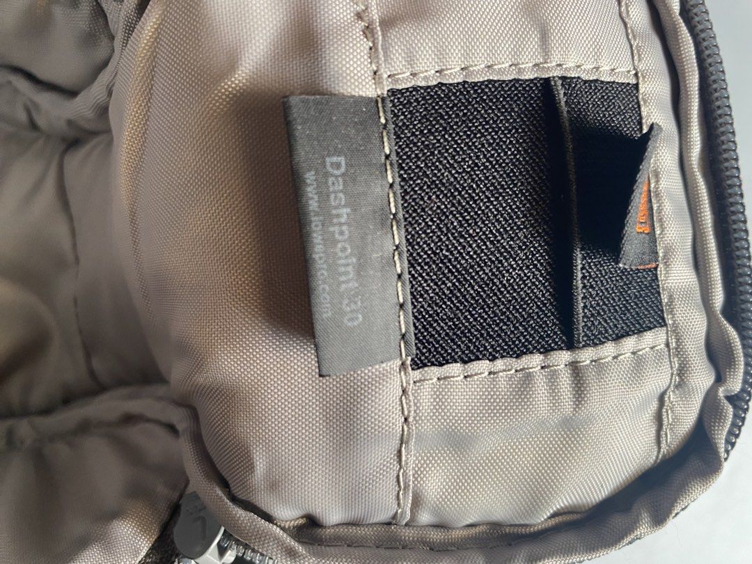 Lowepro Dashpoint 30 Camera Bag (Category: Camera Bags & Carriers) located in Manila. Submitted by thriftwhoop (Listing ID 1437513797, Image 3). Description: - Lowepro Dashpoint 30 camera bag. - Protects your camera and accessories. - Features a shoulder strap for easy carrying. - Includes a main compartment and a small pocket. - Padded interior for equipment safety. - Stylish gray color..