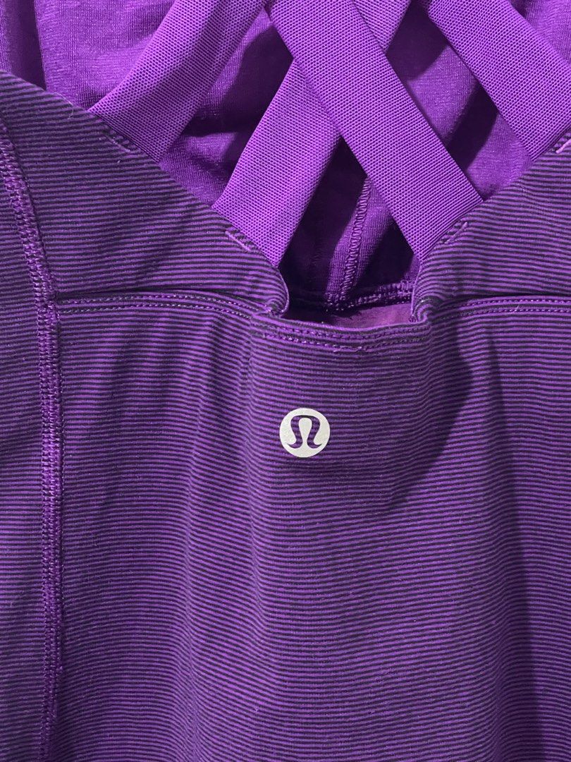 Lululemon Purple CrisscrossTank Top (Category: Activewear) located in Tuguegarao City. Submitted by ziggerryy (Listing ID 1437562659, Image 3). Description: Dot 2 No holes. Minimal flaw on the build in bra(check photos) .
