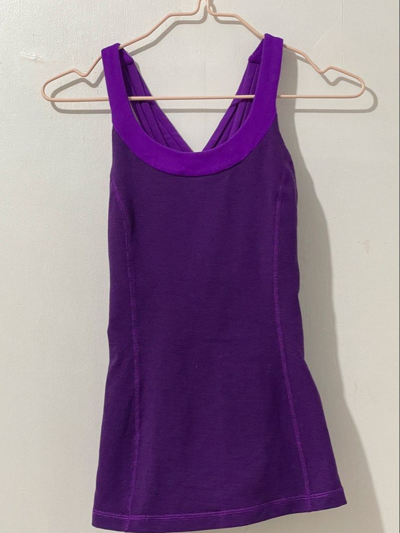 Lululemon Purple CrisscrossTank Top (Category: Activewear) located in Tuguegarao City. Submitted by ziggerryy (Listing ID 1437562659, Image 2). Description: Dot 2 No holes. Minimal flaw on the build in bra(check photos) .
