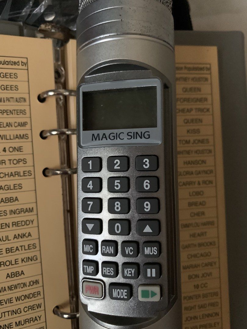 Magic Sing Karaoke Microphone (Category: Microphones) located in Valenzuela. Submitted by blesssing (Listing ID 1437427788, Image 2). Description: Testing is approved 1 to sawa👍 Magic Sing karaoke microphone set. Includes the microphone, song list, cables, and other leather bag. Features a keypad for song selection and control. Comes with a carrying case for easy storage and transport. Includes song chips and a user manual. Perfect for karaoke n