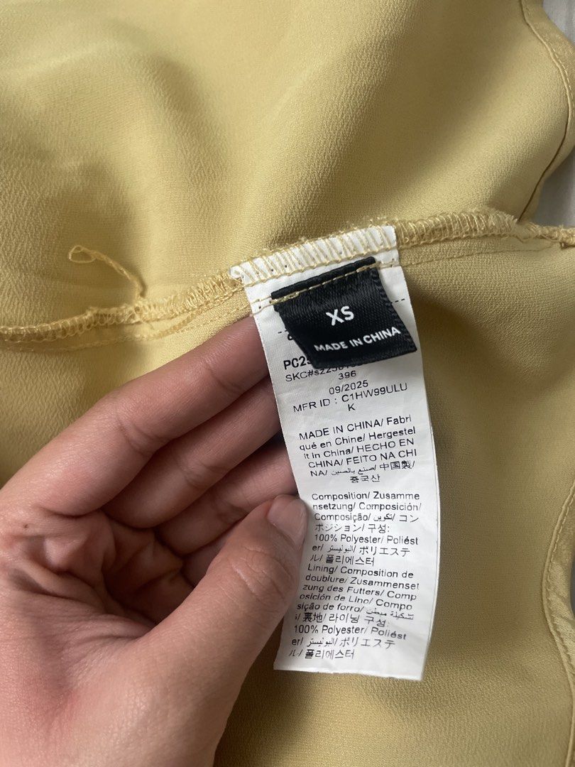 Maija Yellow Spaghetti Lace Strap Cami Top (Category: Sleeveless) located in Antipolo. Submitted by declutterandthrifts (Listing ID 1437538265, Image 2). Description: - Brand: Maija - Worn once - Size: XS - Style: Cami top - Color: Yellow - Features: Spaghetti straps, V-neck, lace detail - Material: 100% polyester - Texture: Satin-like lower part - mod of payment: gcash, maya and go type dm for more questions, and will reply right away :).