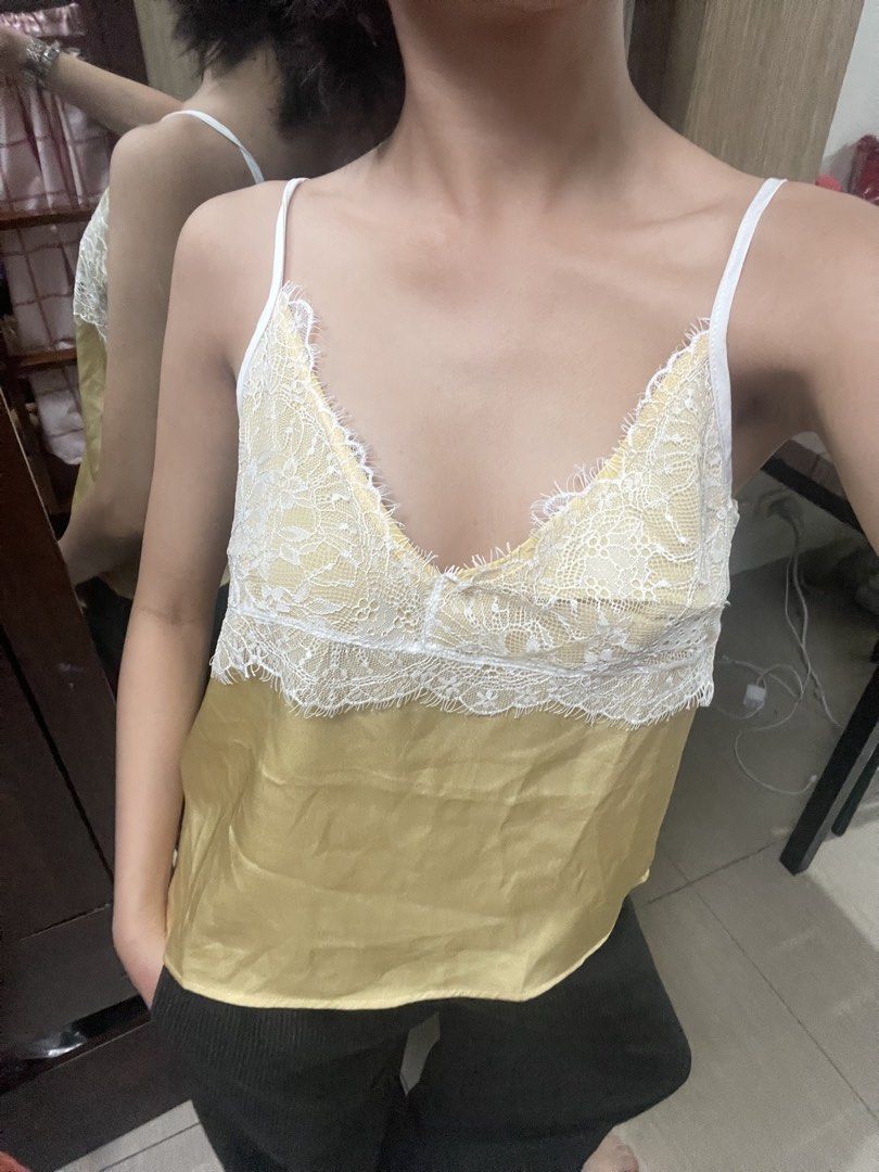 Maija Yellow Spaghetti Lace Strap Cami Top (Category: Sleeveless) located in Antipolo. Submitted by declutterandthrifts (Listing ID 1437538265, Image 1). Description: - Brand: Maija - Worn once - Size: XS - Style: Cami top - Color: Yellow - Features: Spaghetti straps, V-neck, lace detail - Material: 100% polyester - Texture: Satin-like lower part - mod of payment: gcash, maya and go type dm for more questions, and will reply right away :).