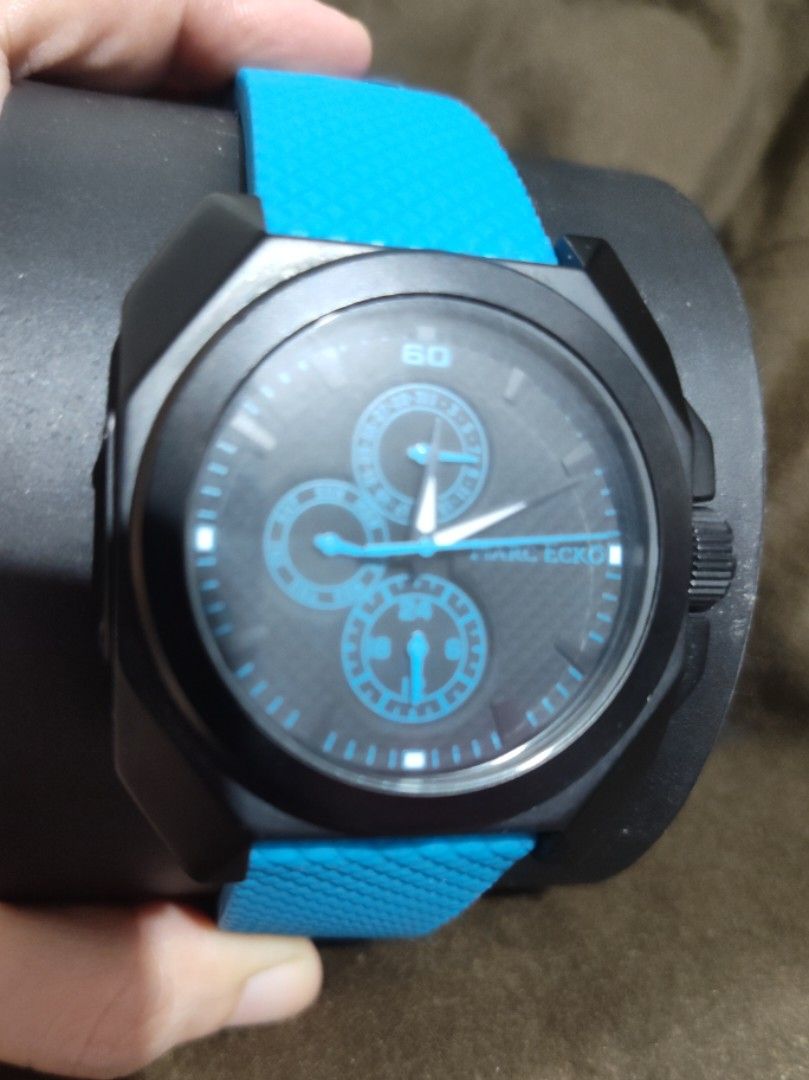 Authentic Marc Ecko Men's Chronograph (Category: Men's Watches) located in Manila. Submitted by karuselkoh (Listing ID 1437433265, Image 1). Description: This is Marc Ecko Pastime Men's Chronograph watch featuring a distinctive black IP stainless steel case paired with a vibrant blue silicone textured strap. WATER RESISTANT 💯👌 with new battery rare model heavy chrono watch.