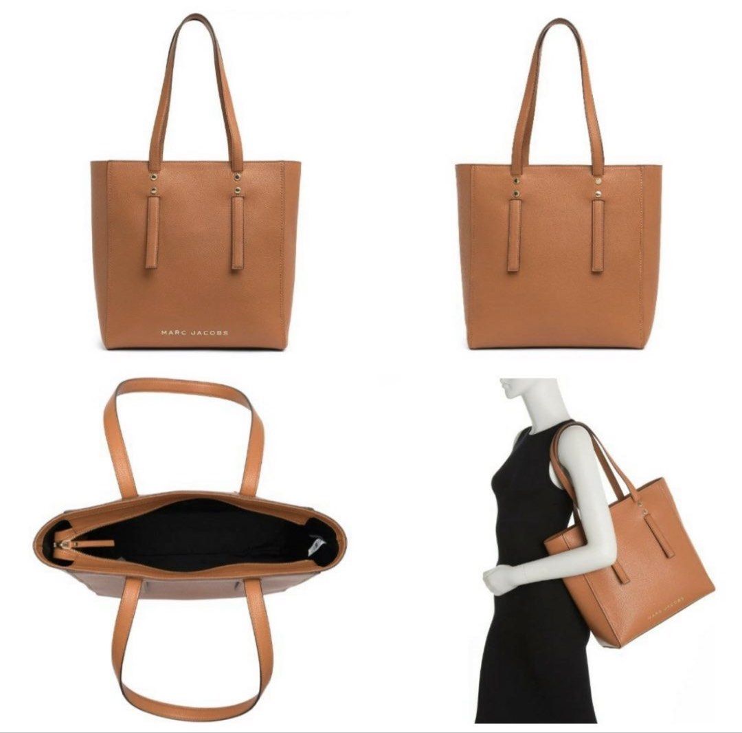 Marc Jacobs Jordan Logo Leather Brown Tote Bag (Category: Luxury Bags & Wallets) located in Muntinlupa City. Submitted by daisydosephh (Listing ID 1437552051, Image 2). Description: Marc Jacobs Jordan Studded Leather Tote NWOT Cognac Brown Pebbled Work Laptop The Perfect Everyday Power Bag > Elevate your professional wardrobe with this sophisticated Marc Jacobs Jordan Tote. Crafted from premium, heavy-grain pebbled leather, this extra-large tote 