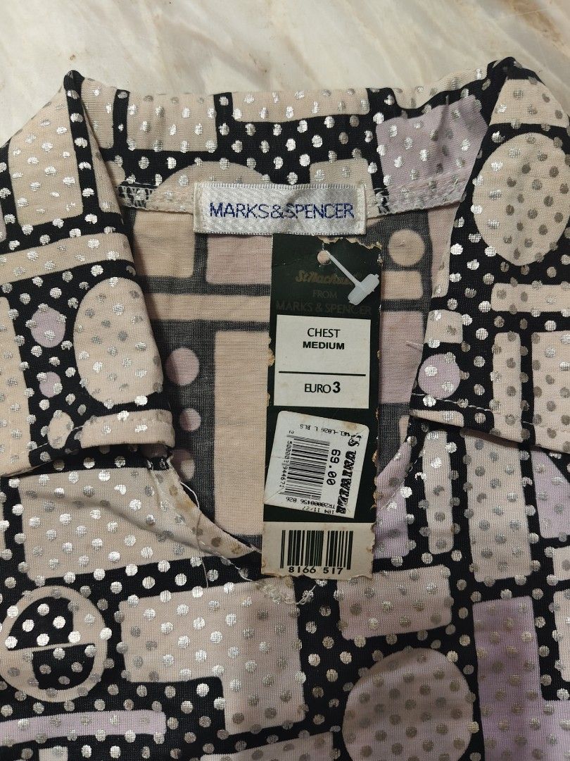 Marks & Spencer polo shirt (with TAG) (Category: Blouses) located in Bulacan. Submitted by angel.decluttersx (Listing ID 1437431956, Image 3). Description: authentic imported 69$ orig price patterned geometric design stretchable freesize S-M.