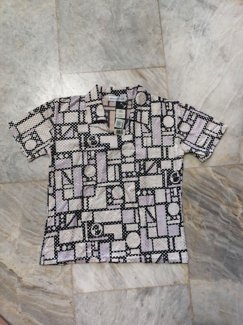 Marks & Spencer polo shirt (with TAG) (Category: Blouses) located in Bulacan. Submitted by angel.decluttersx (Listing ID 1437431956, Image 2). Description: authentic imported 69$ orig price patterned geometric design stretchable freesize S-M.