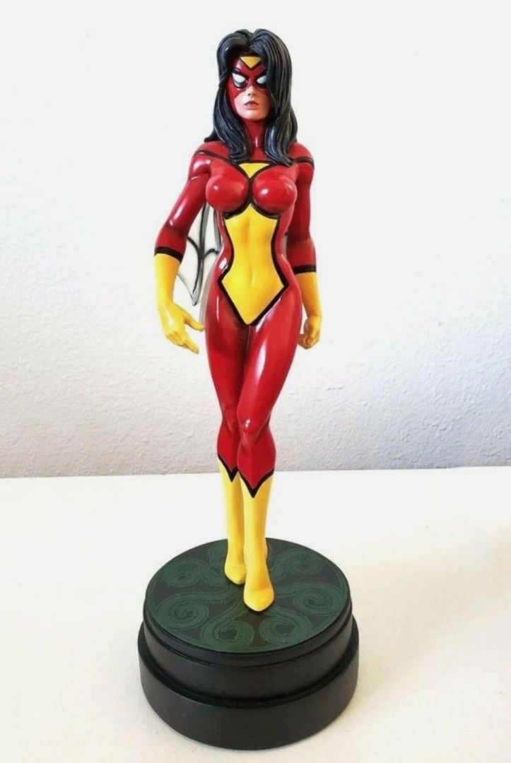 Marvel Spider-Woman Bowen Painted Statue (Category: Figurines & Statues) located in Taguig. Submitted by gowilliam.767 (Listing ID 1437566583, Image 1). Description: - Marvel Spider-Woman statue - Features Spider-Woman in her classic red and yellow costume - Statue is displayed on a circular base - Includes the original box - Perfect collectible for Marvel fans.