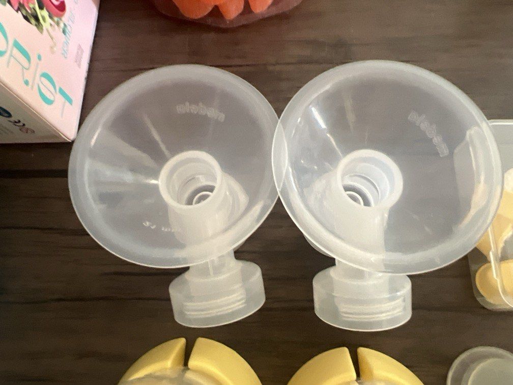 Medela Breast Pump Parts (Category: Breastfeeding & Bottle Feeding) located in Cainta. Submitted by hunchester (Listing ID 1437413051, Image 3). Description: - Includes: Breast shields, bottles, connectors, tubing, yellow bottle caps, and a small brush. - Clean and ready for use. - Perfect for replacement parts or building a pumping setup. - Compatible with Medela breast pumps. -with freebies .