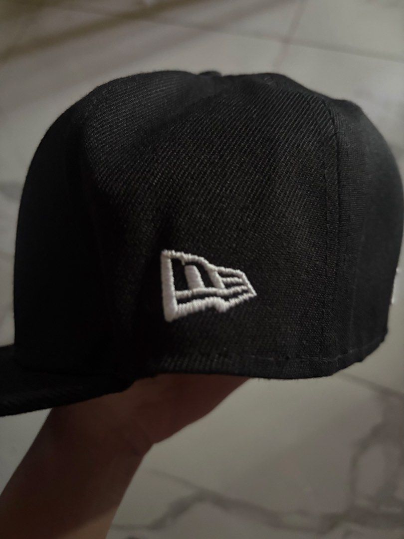 New Era 59FIFTY Los Angeles Dodgers Cap (Category: Caps & Hats) located in Navotas City. Submitted by izzmya (Listing ID 1437468963, Image 3). Description: - New Era 59FIFTY cap - Los Angeles Dodgers logo - Black color - Flat brim - Fitted design - Size: 7 1/4 - MLB logo on the back - New Era logo on the side - Cooperstown Collection.