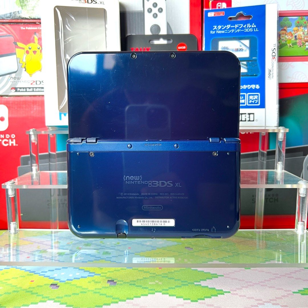 New Nintendo 3DS XL (Category: Nintendo) located in Manila. Submitted by gamejaystore (Listing ID 1407397616, Image 2). Description: For sale! New Nintendo 3DS XL Unit is good condition, buttons, triggers, analog, volume, and 3D are tested. 9-9.3/10 body condition and screen protected. No history of repair or never naopen ang unit, original rubbers are still intact. Already modded or jailbreak with 64GB ADATA SD card loaded with games. Incluson: 