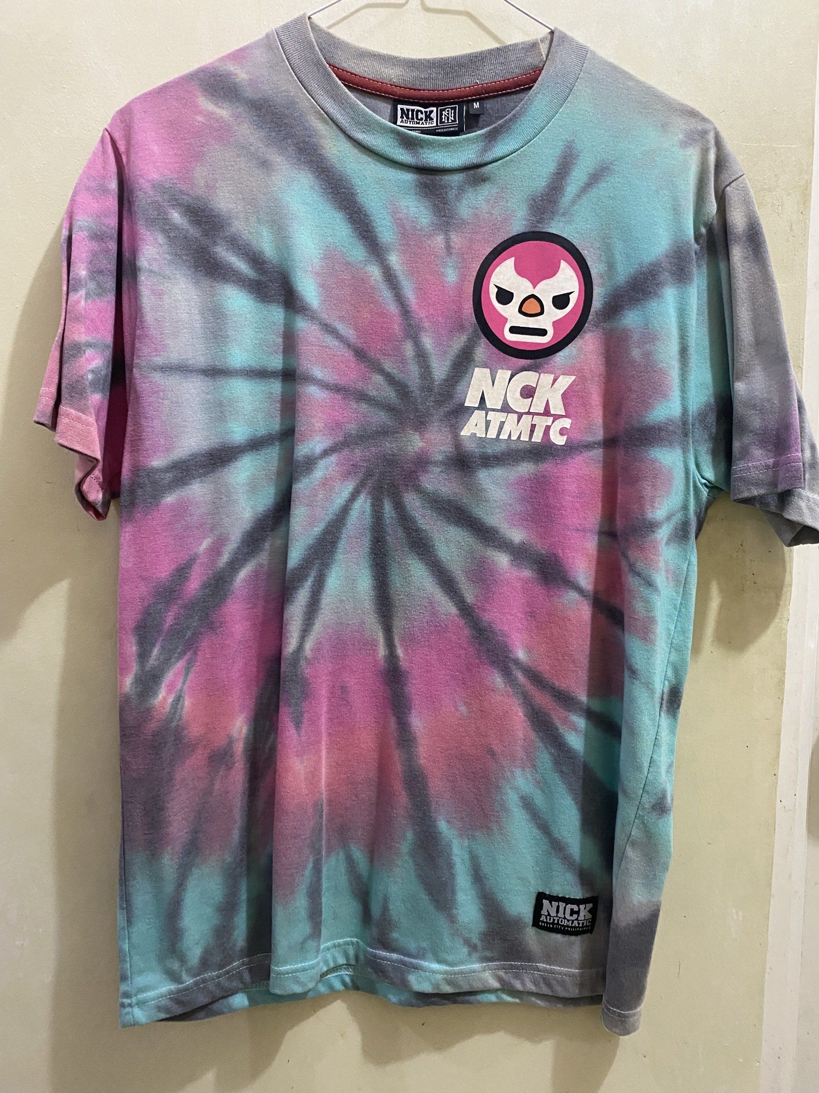 Nick Automatic Tie-dye Graphic Tee - Medium (Category: Tshirts & Polo Shirts ) located in Manila. Submitted by ftdz29 (Listing ID 1437538480, Image 1). Description: Nick Automatic Tie dye USED MEDIUM Chest: 19" Length: 27".