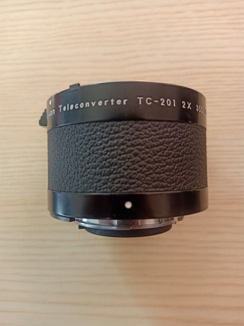Nikon Teleconverter TC-201 2X (Category: Cameras) located in Las Pinas. Submitted by the_recycle_shop (Listing ID 1437401141, Image 1). Description: - Nikon TC-201 2X Teleconverter - Made in Japan - Doubles the focal length of your lens - Features a textured grip - Well-maintained - Ideal for extending your reach.