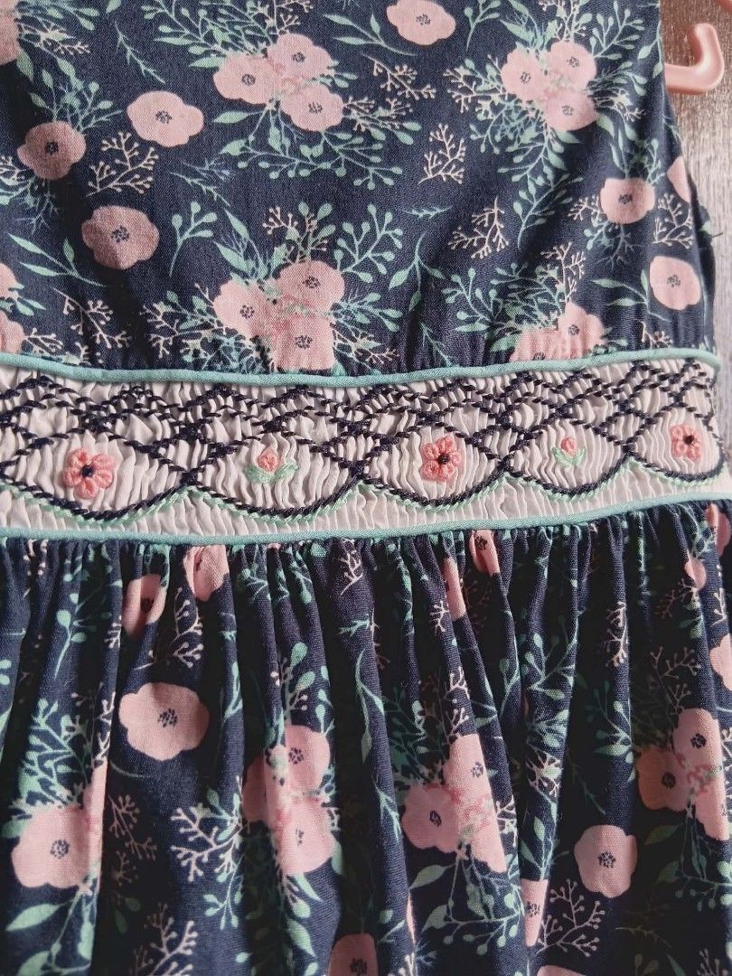 Periwinle Floral Dress 2Y (Category: Babies & Kids Fashion) located in Kalibo. Submitted by kerstinmmmm (Listing ID 1437481171, Image 3). Description: - Periwinkle dress - Navy blue floral print - Size: 2Y -Brand New Price: php800 - Smocked waist with pink and white floral accents - Sleeveless - Round neckline - Ideal for toddlers.