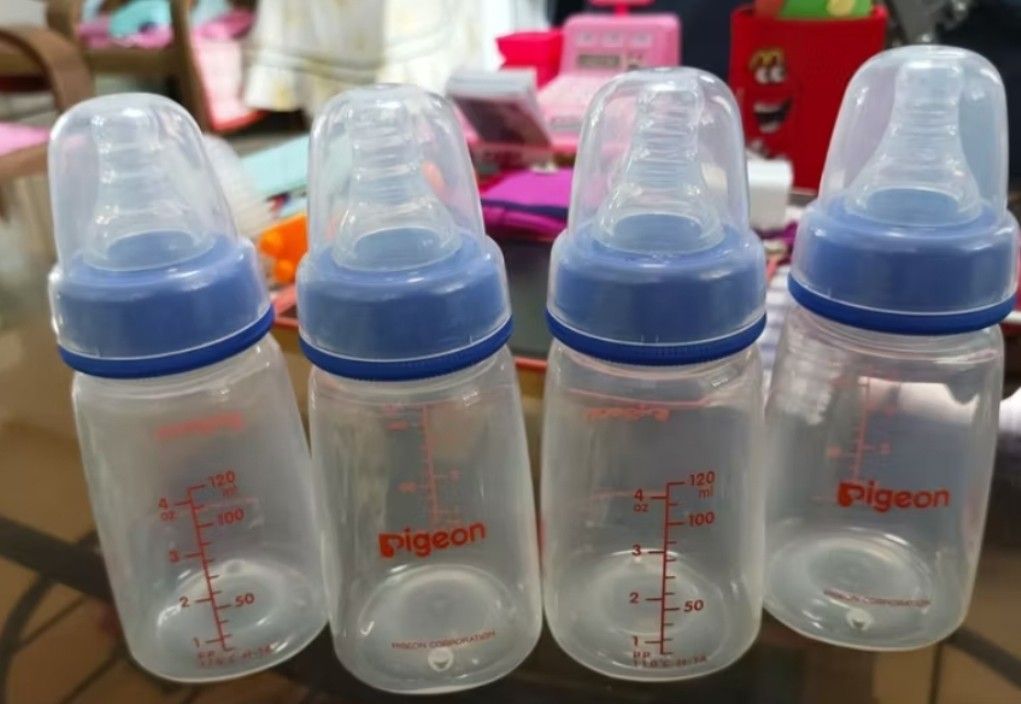 6pcs Pigeon RPP Standard Feeding Bottle (Category: Breastfeeding & Bottle Feeding) located in Agdangan. Submitted by chuisstuff (Listing ID 1437412164, Image 3). Description: - Four (4) 120ml bottles with blue caps - Two (2) 120ml bottles with red caps RFS: Baby doesn't use this anymore.