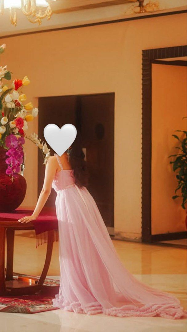 Pink Tulle Gown (Category: Evening dresses & gowns) located in Manila. Submitted by blossm (Listing ID 1437476226, Image 2). Description: - Elegant pink tulle gown - Sweetheart neckline - Delicate straps - Flowing skirt - Fitted bodice - Layered tulle skirt - Long train - Ruffled hem - Perfect for special occasions.