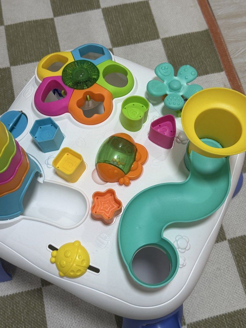 Playgro sensory Table for Babies and Toddlers (Category: Infant Playtime) located in Manila. Submitted by shopelisse (Listing ID 1437508894, Image 2). Description: - Colorful activity table for toddlers. - Includes stacking tower, ball run, and shape sorters. - White surface with colorful toys and blue legs. - Designed to stimulate sensory development. - Encourages fine motor skills. - Perfect for toddlers. Bought for 3500.