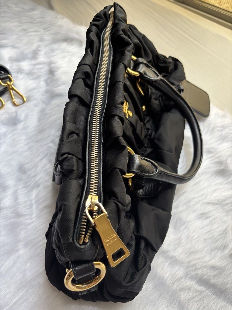 Prada Black Gaufre Tessuto Small (Category: Luxury Bags & Wallets) located in Marikina City. Submitted by chiya.s0821 (Listing ID 1437428914, Image 3). Description: Purchased this Prada bag from Styliste Manila (online seller) back in 2017. Still in very good condition and hardly used. RFS: To raise funds for travel..