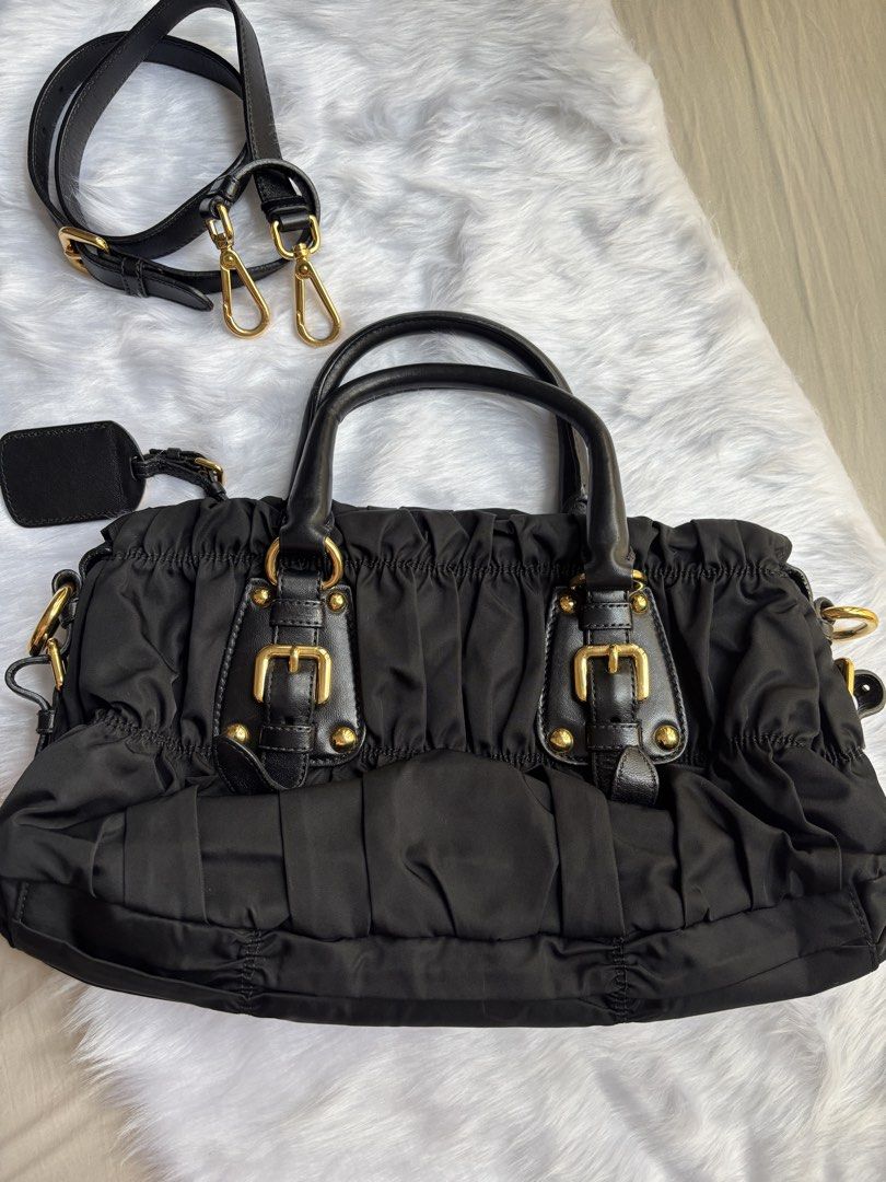 Prada Black Gaufre Tessuto Small (Category: Luxury Bags & Wallets) located in Marikina City. Submitted by chiya.s0821 (Listing ID 1437428914, Image 2). Description: Purchased this Prada bag from Styliste Manila (online seller) back in 2017. Still in very good condition and hardly used. RFS: To raise funds for travel..