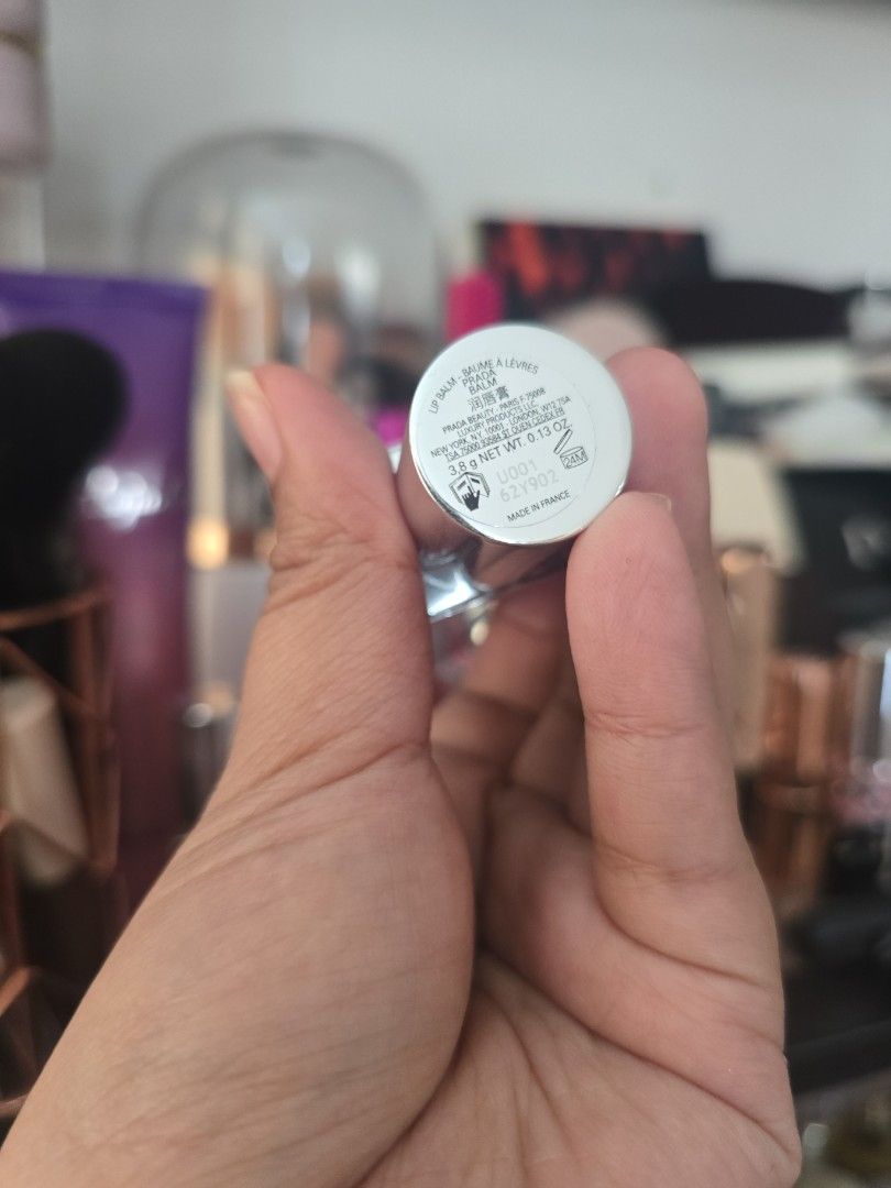 Prada Lipstick (Category: Makeup) located in Taguig. Submitted by jubeiqiao03 (Listing ID 1437476269, Image 3). Description: - Prada lipstick - Silver tube with Prada logo - Light blue lipstick color - Sticker on the bottom of the tube.
