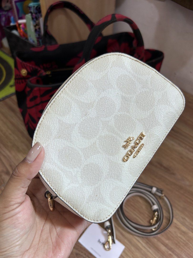 Preloved AUTHENTIC COACH Mini sling bag (Category: Luxury Bags & Wallets) located in Santa Rosa. Submitted by mhainers (Listing ID 1437415149, Image 1). Description: 101% Authentic First owner In good condition No rubs Normal sign of usage Nakatago lang din sa closet Bought from USA Loc. sta Rosa Laguna .