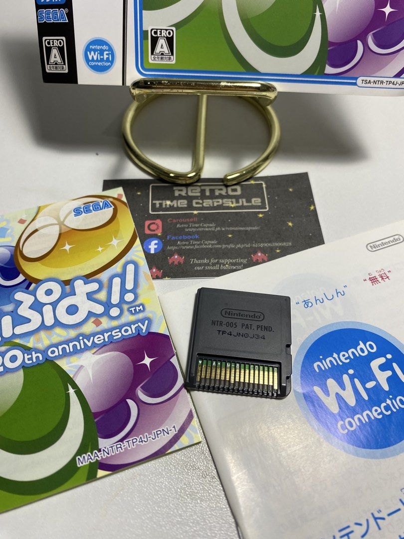 Puyo Puyo!! 20th Anniversary- DS (Category: Nintendo) located in Manila. Submitted by retrotimecapsule (Listing ID 1437529897, Image 2). Description: For Sale! (On Hand) (Please PM before DIBS) Puyo Puyo!! 20th Anniversary DS- ₱300.00 Note: Posting dibs without PM or Reply to our message is not Valid. CONDITION: Good Condition Pins, Working Can test upon meet up or pick up DESCRIPTIONS: 1PC Available With Case Cover (No Case) With Insert With Man