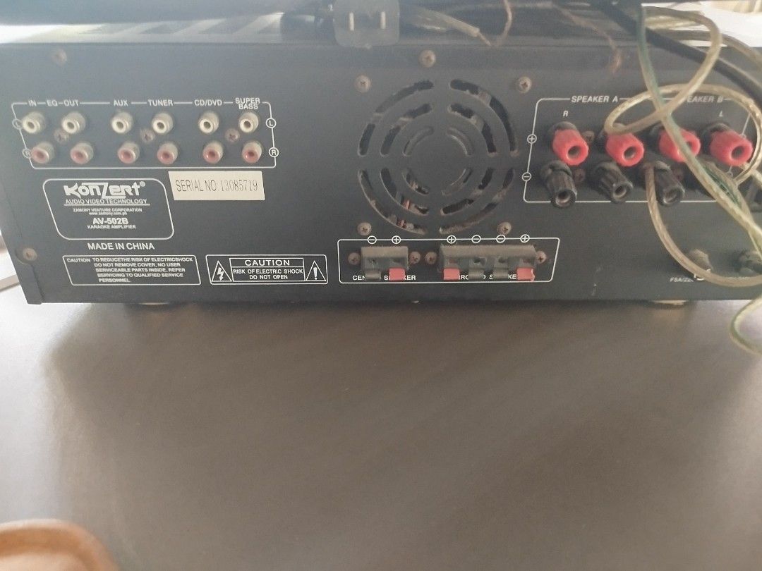 PVY Speakers + Konzert Amplifier + Karaoke Set (Category: Soundbars, Speakers & Amplifiers) located in Marikina City. Submitted by simoxtie (Listing ID 1437509320, Image 3). Description: Complete karaoke set including PVY speakers, a Konzert AV-5028 amplifier, and a Megapro karaoke system. The amplifier has multiple input and output ports, including tuner and aux. The speakers have a mesh grill. The karaoke set comes with a microphone. Perfect fo