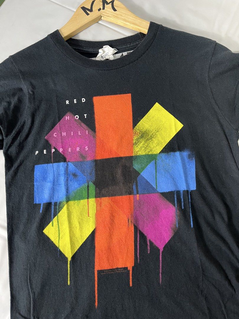 Red Hot Chili Peppers Graphic Tee (Category: Tshirts & Polo Shirts ) located in Baguio. Submitted by cosmicgem_21b525 (Listing ID 1437514907, Image 2). Description: - Red Hot Chili Peppers t-shirt - Features the band's logo graphic - Graphic has a dripping paint effect - Crew neck and short sleeves - Brand: Bay Island Sportswear - Size: Small.