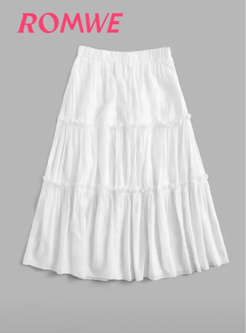 ROMWE White Tiered Maxi Skirt (Category: Skirts) located in Bacolod City. Submitted by asie_ (Listing ID 1437535380, Image 1). Description: - ROMWE white maxi skirt - Tiered design with ruffled details - Features an elastic waistband - Made of lightweight fabric - Ideal for warm weather - Versatile for various looks.
