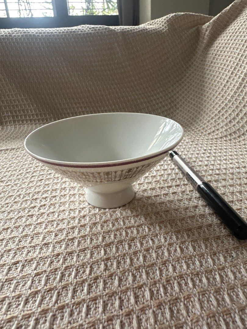 Royal China Footed Bowl (Category: Other Kitchenware & Tableware) located in Cainta. Submitted by shopbyyna (Listing ID 1437419125, Image 2). Description: - Royal China footed bowl - White base with gold and maroon rim pattern - Small footed base - Wide opening - Royal China logo visible - Ideal for serving or display.