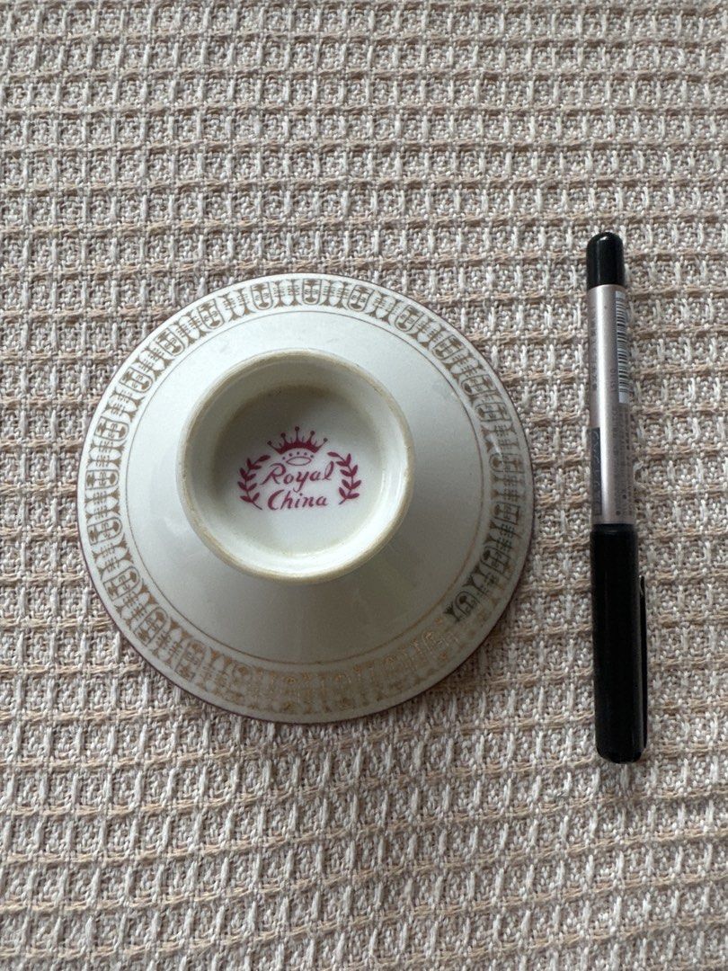 Royal China Footed Bowl (Category: Other Kitchenware & Tableware) located in Cainta. Submitted by shopbyyna (Listing ID 1437419125, Image 1). Description: - Royal China footed bowl - White base with gold and maroon rim pattern - Small footed base - Wide opening - Royal China logo visible - Ideal for serving or display.