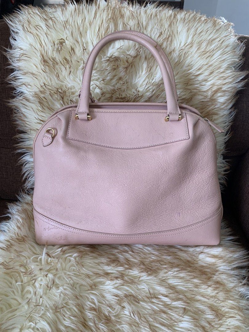 Samantha Thavasa Pink Shoulder Handbag (Category: Luxury Bags & Wallets) located in Cavite. Submitted by mommydaddybabyshop (Listing ID 1394290185, Image 2). Description: 🇯🇵 Preloved Authentic Samantha Thavasa- Japan ✅ Intact Leather ✅Clean interior/ gold hardware ✅Has a large space/ capacity to hold stuff Condition: Has scratches in front, at the back and small rubbings in 4 corners Nego price, Pm is the key ❤️ ❌Strictly NO COD Mop: gcash/bank