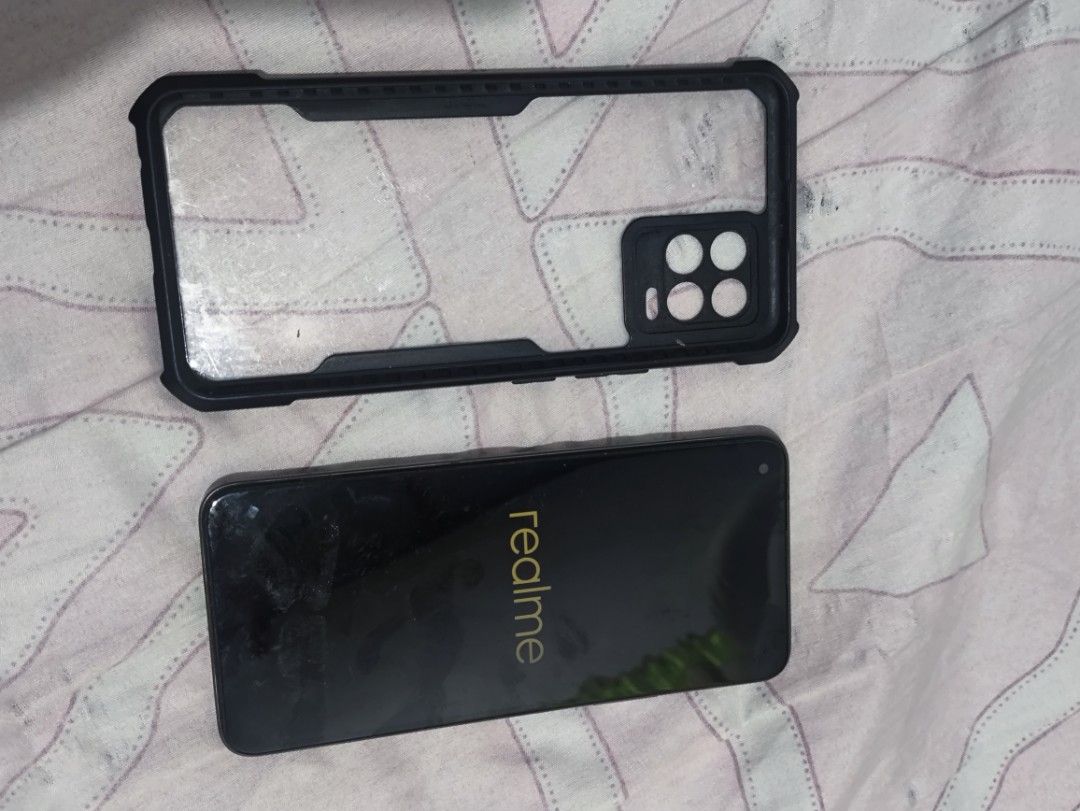 Selling my real me 8 (Category: Realme) located in Caloocan City. Submitted by raredolphin_107586 (Listing ID 1437429272, Image 2). Description: - Realme 8 for sale - Black color - Includes a protective case - 128GB storage - Meetup available at Pan de Manila, Dasmariñas City.