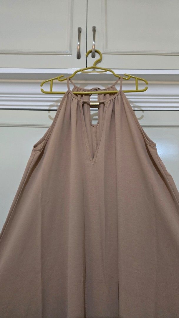 Shein Light Brown Halter Dress (Category: Dresses) located in Quezon City. Submitted by rachelleee_ (Listing ID 1437426073, Image 3). Description: Shein Light Brown Halter Dress Design: Halter neck with flowing silhouette Color: Light brown Neckline: V-neckline Back: Keyhole with ribbon Size: Small, EU 36, US 4 Used once only.