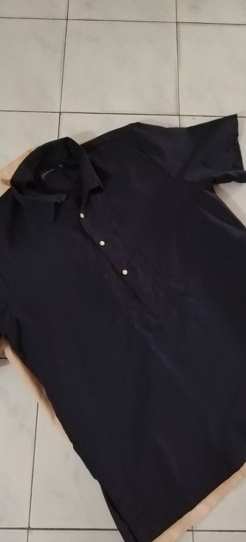 Short Sleeve Polo Shirt (Category: Tshirts & Polo Shirts ) located in Taytay. Submitted by nica.castejon.oraa (Listing ID 1437572377, Image 2). Description: - Short sleeve polo shirts (BARONG TYPE) - Available in navy blue and beige - Navy blue: collared neckline, chest pocket - Beige: V-neck design - Button-up closure - Made of smooth, possibly woven fabric NAVY BLUE - LARGE CREAM - XTRA LARGE TAKE IT ALL FOR 500.00 RFS: MEDIUM SIZE NA YUNG MAG 