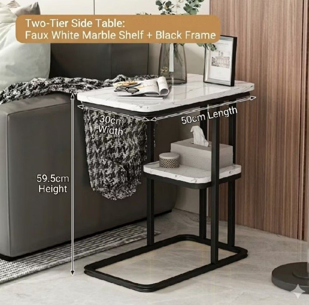 Side Table 2 Layer Sofa / Bedside (Marble White with Black Frame) (Category: Tables & Sets) located in Pateros City. Submitted by camillelego (Listing ID 1437575729, Image 2). Description: Side Table 2 Layer Sofa / Bedside (Marble White with Black Frame) Assembled, pickup as is Easy to Clean Made of thicken environmental protection board, imitating marble pattern Has a stable paint, steel frame, strong bearing capacity Safe rounded corners, round