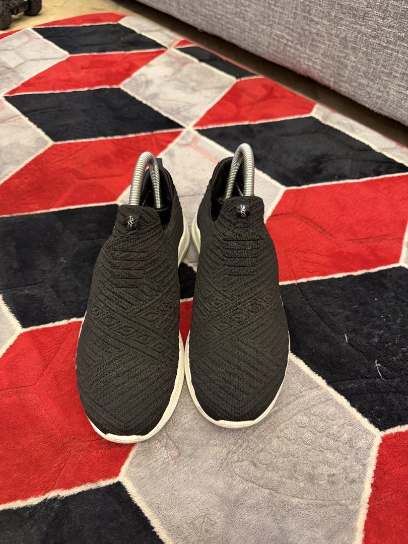 Skechers Slip-on Sneakers (Category: Sneakers) located in San Jose. Submitted by affordabletrendsby_cai (Listing ID 1437416598, Image 1). Description: - Black Skechers slip-on sneakers - White soles - Textured knit upper - Skechers logo on side and heel - Pull tab for easy wear - Lightly worn soles.