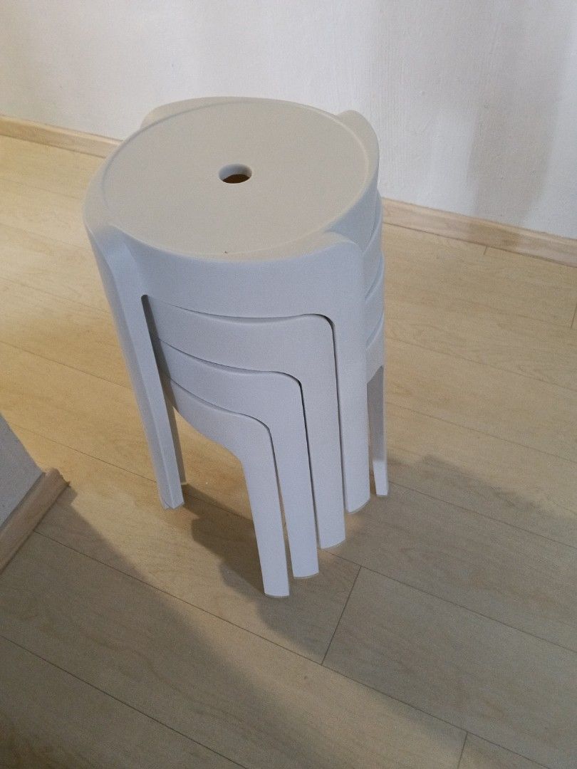 Stackable White Plastic Stools (Category: Chairs) located in Singapore. Submitted by please_buy.com (Listing ID 1437458652, Image 1). Description: - Set of stackable white plastic stools - Perfect for extra seating - Great for small spaces - Durable and easy to clean - Suitable for indoor or outdoor use 1 for $5 4 for$20.