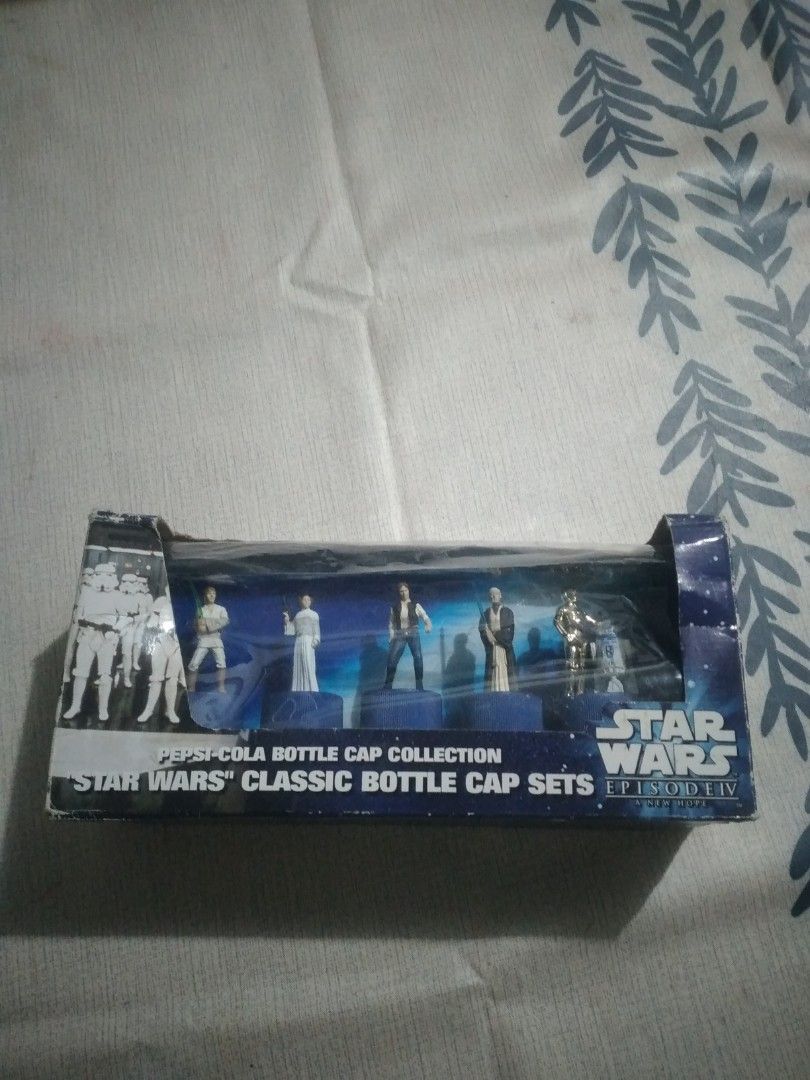 Star Wars Pepsi Bottle Cap Collectors item (Category: Vintage Collectibles) located in San Fernando. Submitted by kitkat.astina (Listing ID 1437531166, Image 1). Description: in pristine condition, Characters Included: The set features Luke Skywalker, Princess Leia, Han Solo, Obi-Wan Kenobi, and a combined C-3PO & R2-D2 figure. Origin: These were promotional items exclusively released with Pepsi bottles in Japan. Value: Complete sets or individua