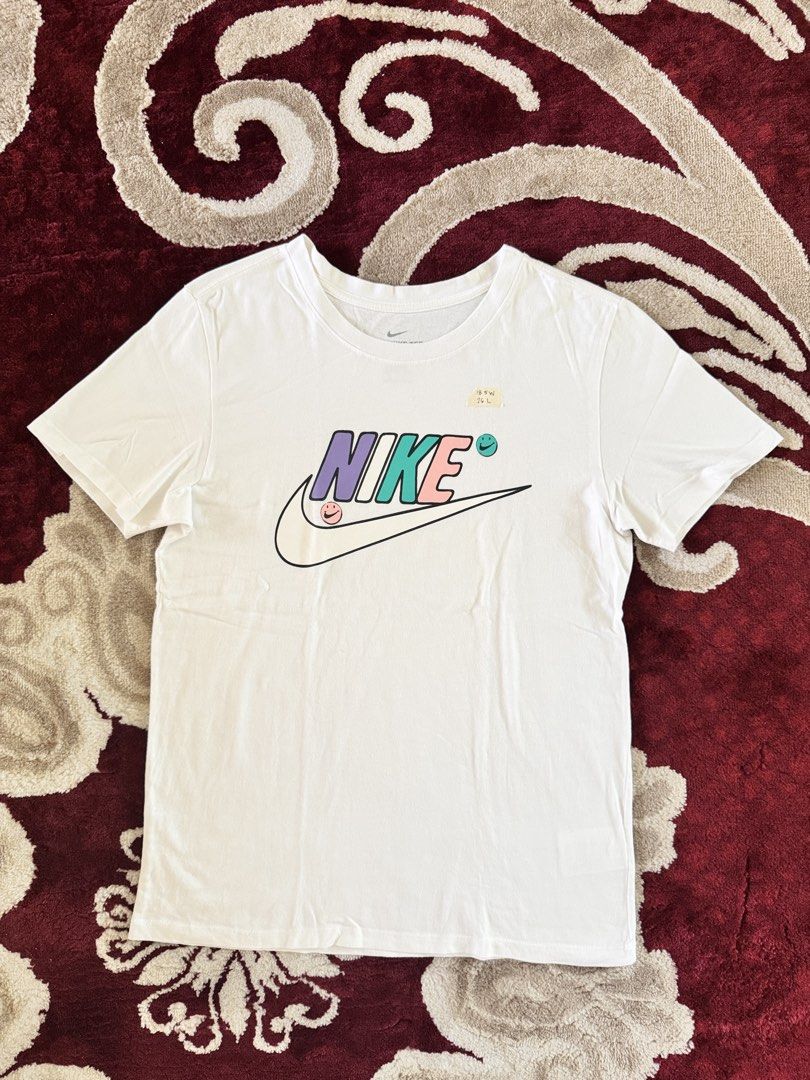 The Nike Tee Graphic T-Shirt (Category: Blouses) located in Davao. Submitted by engrd. (Listing ID 1437402279, Image 1). Description: 18.5 width x 26 length no flaws.