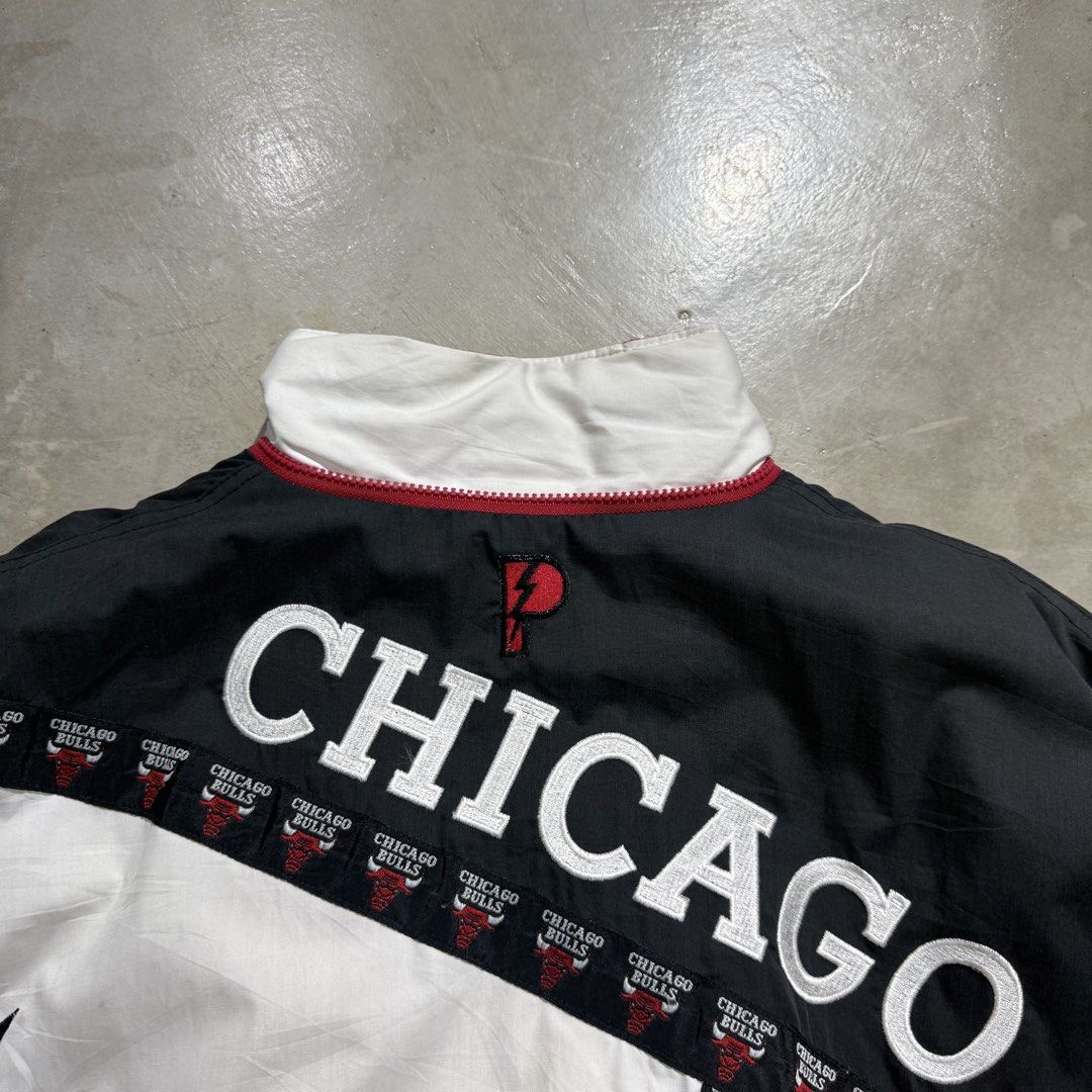 Vintage 1990s Chicago Bulls Pro Player Jacket (Category: Coats, Jackets and Outerwear) located in Pulilan. Submitted by secondary_chives (Listing ID 1437554060, Image 2). Description: Size Large on Tag Width: 24.5 inches Length 28.5 inches.