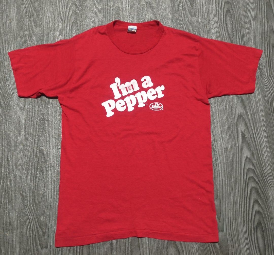 Vintage 80's Dr. Pepper Shirt (Category: Tshirts & Polo Shirts ) located in Infanta. Submitted by gnystage (Listing ID 1437514644, Image 1). Description: Vintage 80's Dr. Pepper Shirt Large On Tag fit S-M Issue Crack Prints.